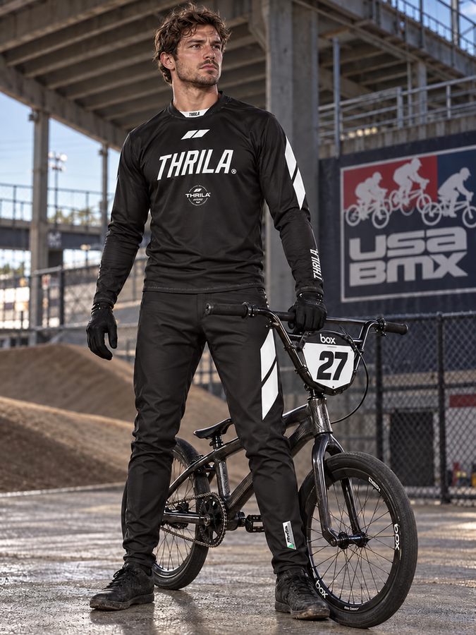 THRILA Flight Black BMX racewear on a rider