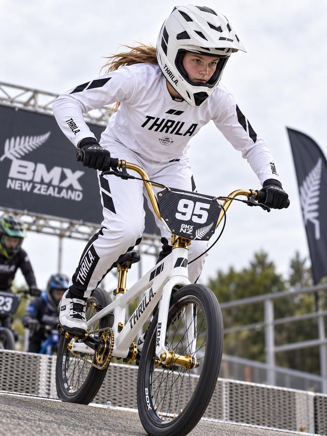 THRILA Flight White BMX racewear on a rider