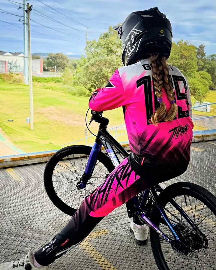 THRILA Vulcan Pink BMX/MTN Bike racewear on a rider
