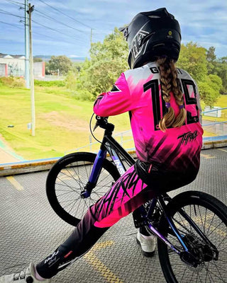 THRILA Vulcan Pink BMX/MTN Bike racewear on a rider